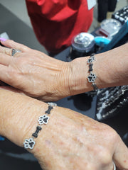 Shimming C.Z. Paws And Bones Bracelet In Sterling Silver W/Rhodium Plating