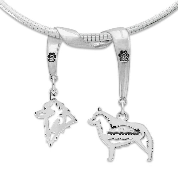 Schipperke Necklace Head and Body Designs on Paw Print Charm Holder in Sterling Silver on Omega Chain.